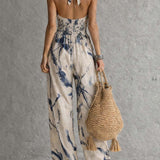 Sabryna - Halter Jumpsuit with Ink Print Design