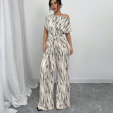 KENDI™ - Elegant Wide-Leg Jumpsuit with Asymmetrical Strap