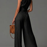 Victória - Black Sleeveless V-Neck Chiffon Jumpsuit with Pleated Wide Legs and Zip-Up Closure