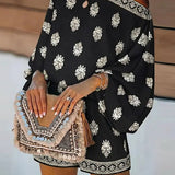 Off-Shoulder Baroque Print Jumpsuit Featuring Lantern Sleeves and Shorts
